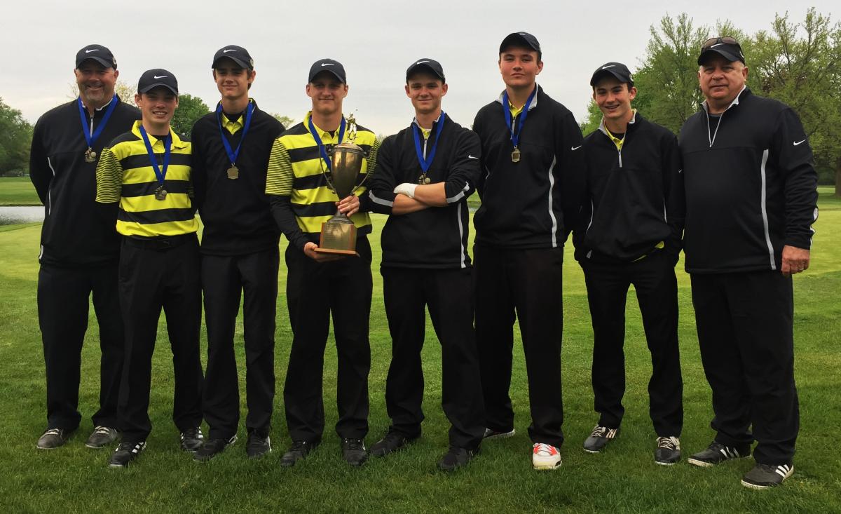 Penn Boys Golf wins a trophy.
