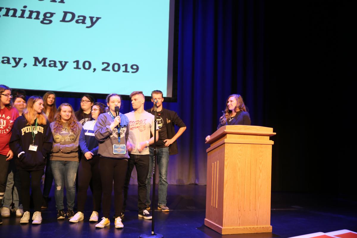 Mrs. Sarah Dwigans being thanked by her students