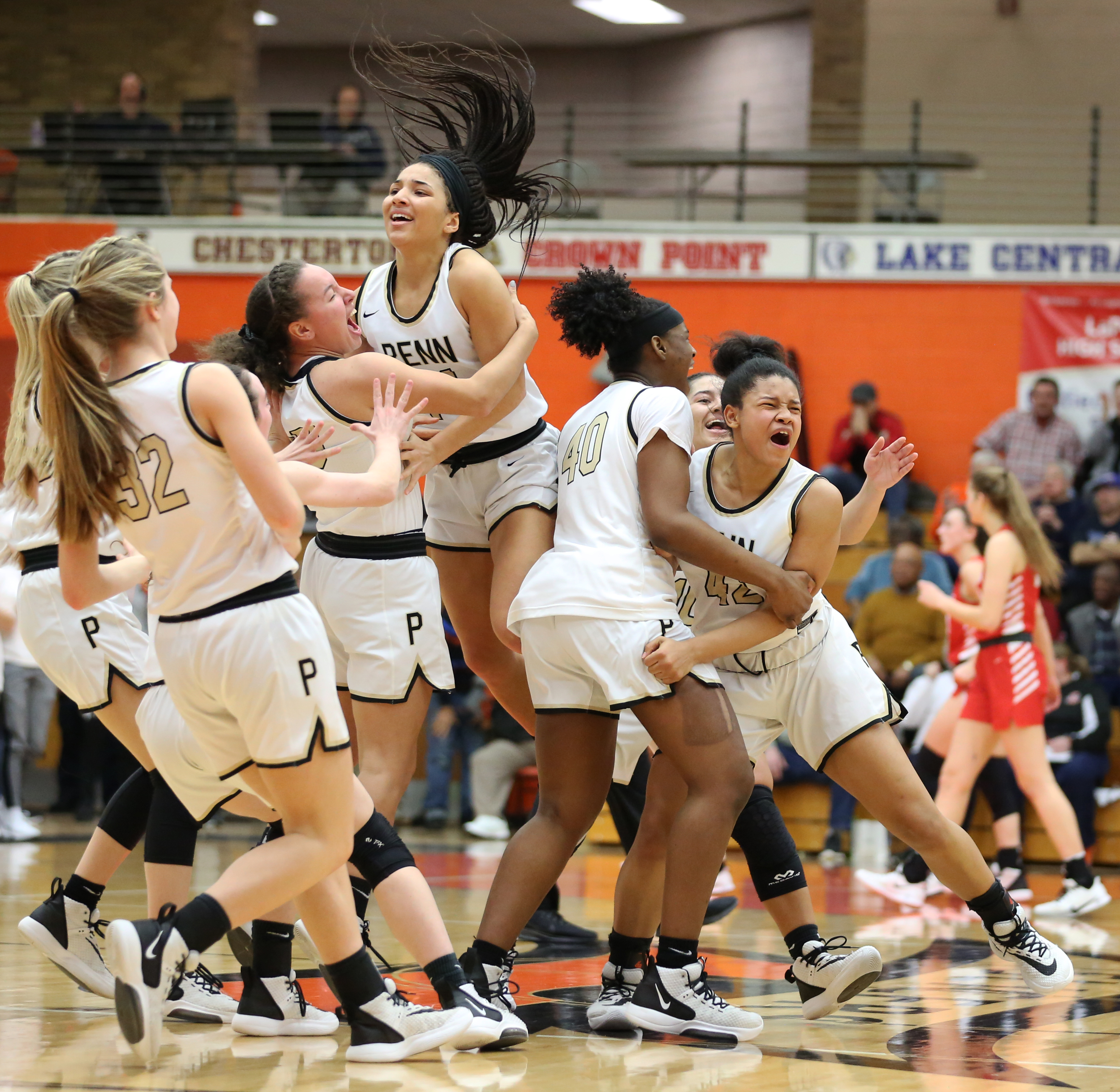 Penn Girls Basketball celebrates Regional victory vs. Crown Point.