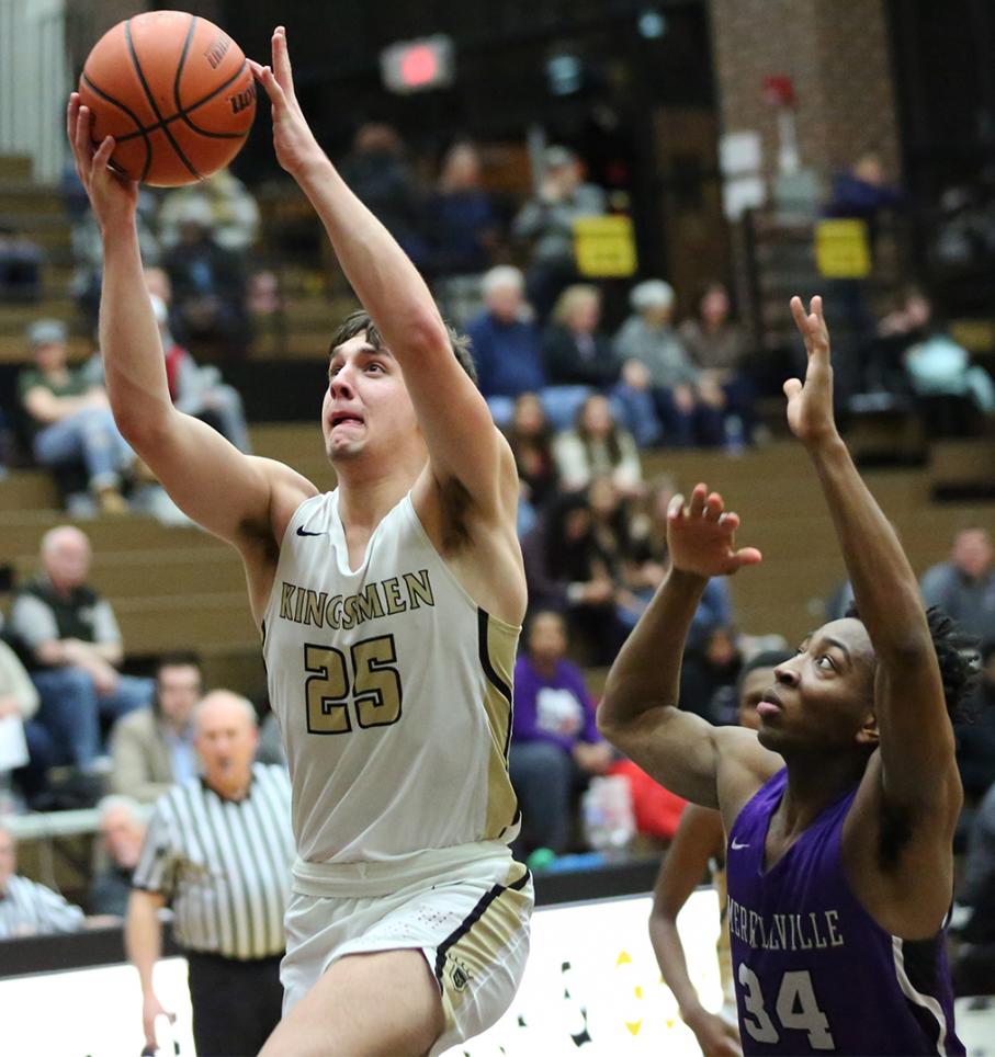 Penn's Derek Derda drives to the hoop.