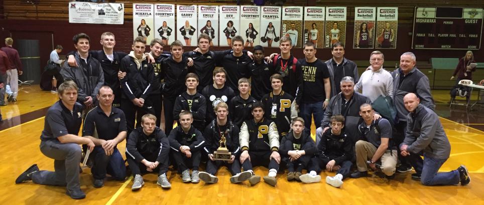 Penn Wrestlers pose for a team photo after winning the NIC championship.