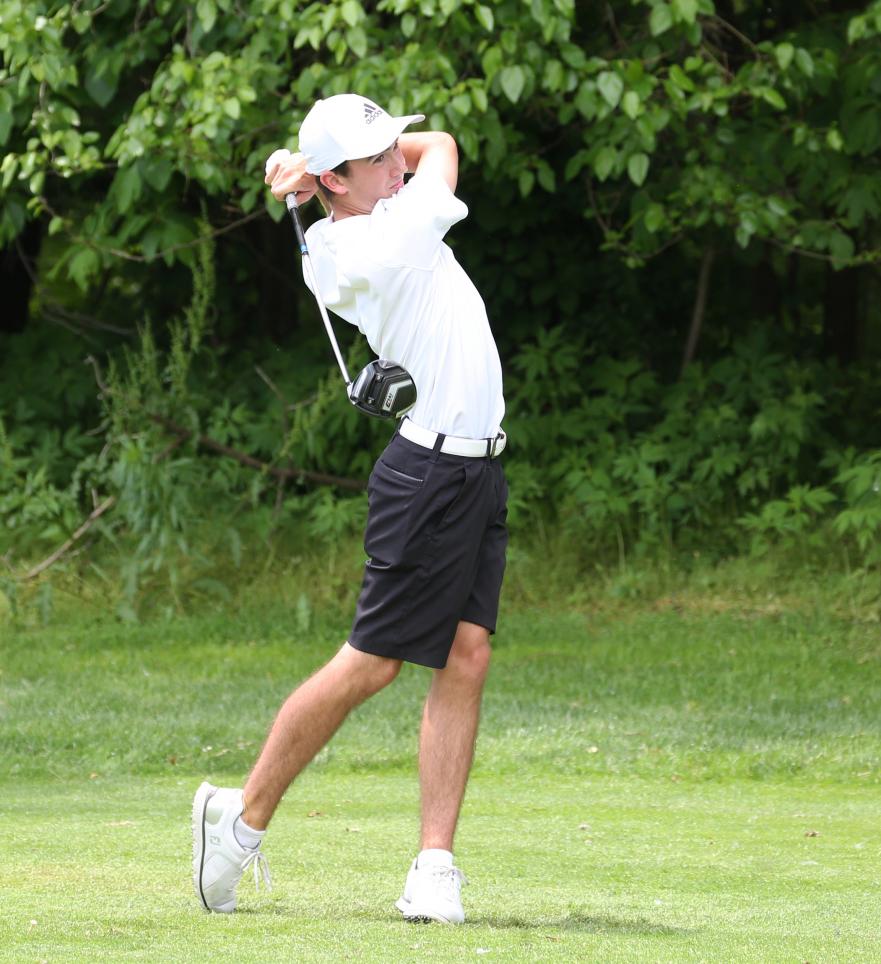 Josh Yoder fires a shot off the tee.