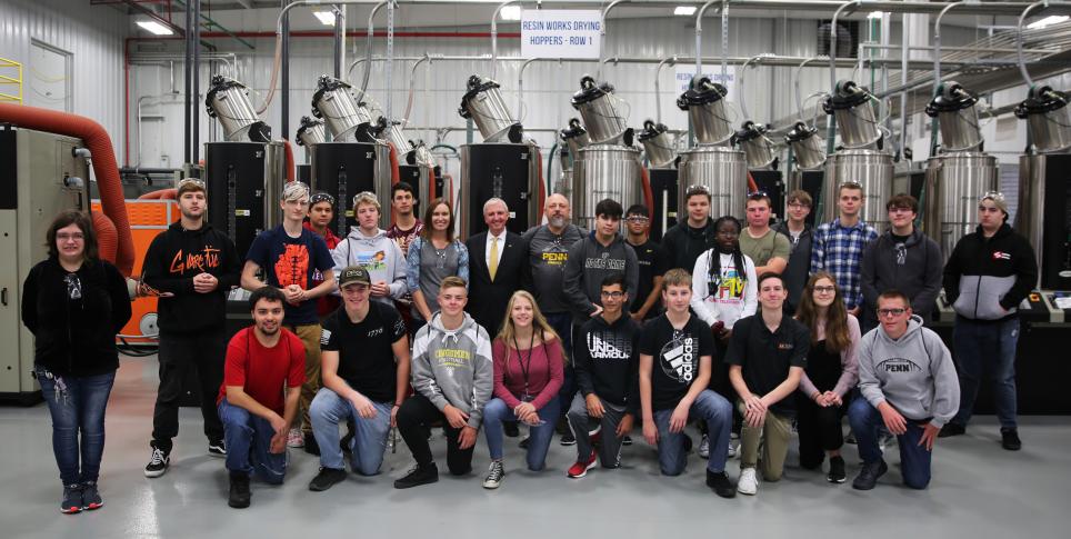 P-H-M Supt. Dr. Jerry Thacker, Penn Instructors Tara Pieters & Scott Shelhart, and Penn students at the Manufacturing Day Kickoff.
