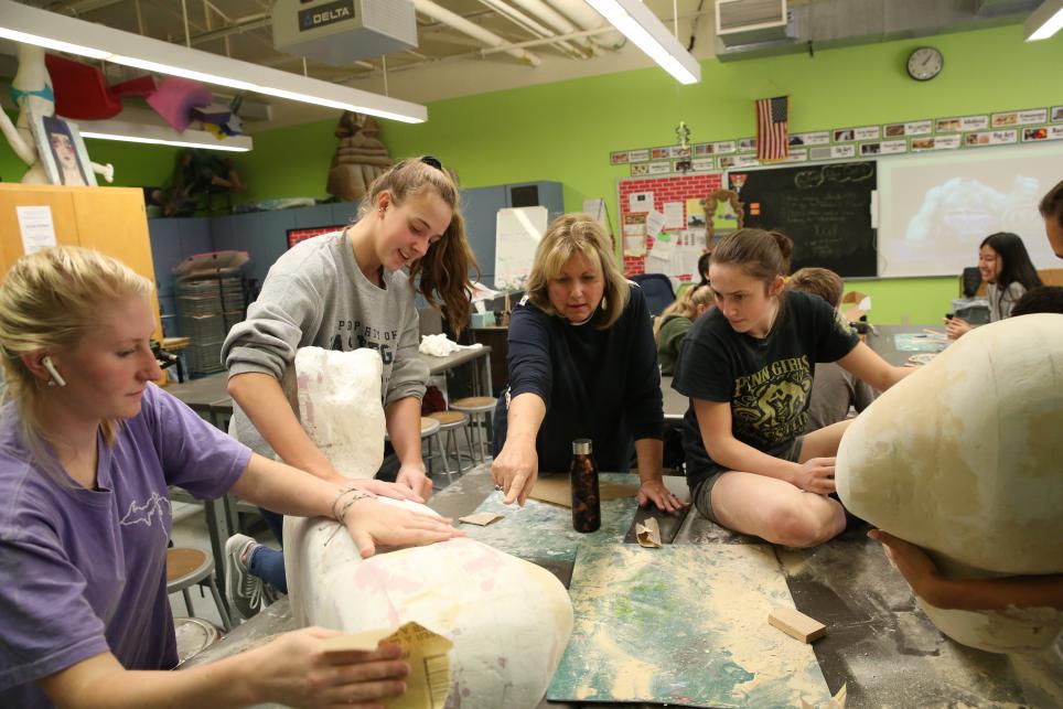 Sculpture students working on the Hulk Magic Wheelchair
