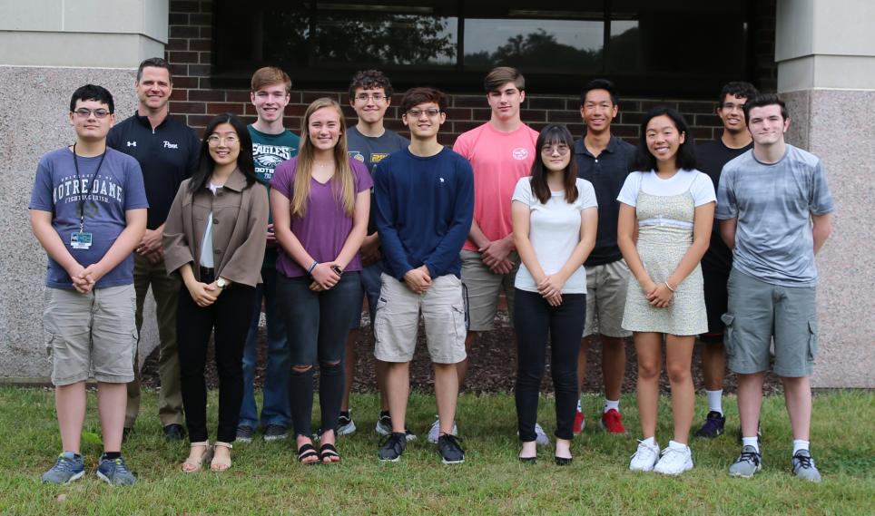 Principal Sean Galiher and Penn's 2019 National Merit Scholarship Semifinalists.