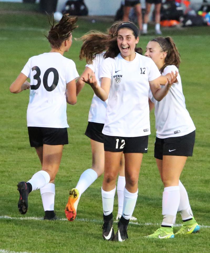 Maya Lacognato celebrates a goal.