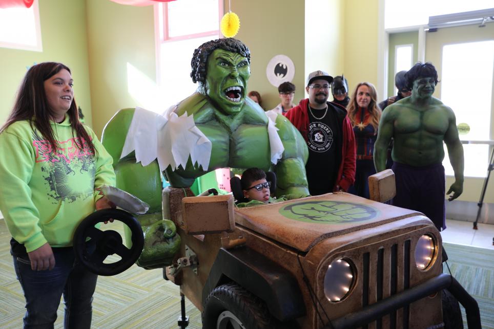 Zephan Cantu in his "Hulk Smash Machine" with Mom & Dad Leann and Lupe Cantu