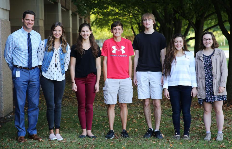 Penn High School Principal Sean Galiher, far left, and Penn's National Merit Scholarship Finalists: Kendra Laidig, Margaret Finnessy, Nicholas Casetti, Shane Hullinger, Renee Yaseen and Kristine Hocker.