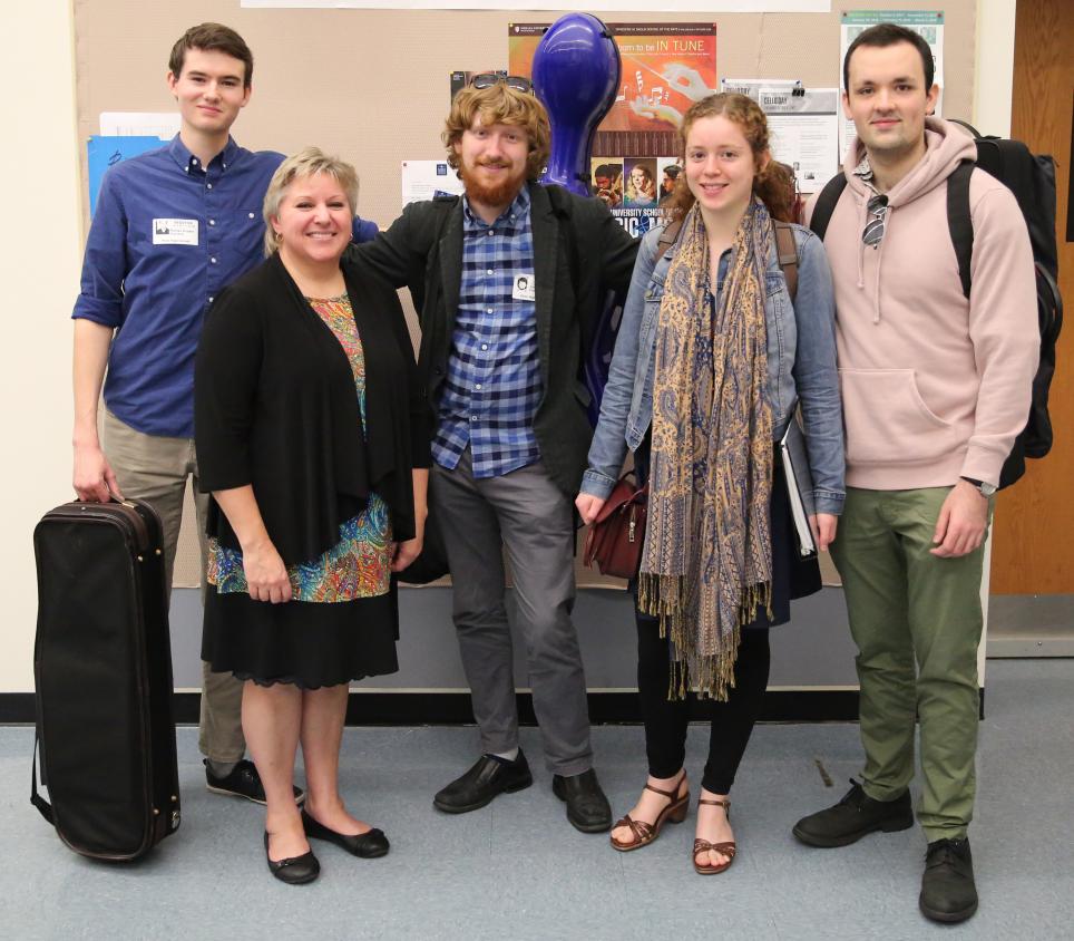 Penn Orchestra Instructor Anne Tschetter with the Milton String Quartet.