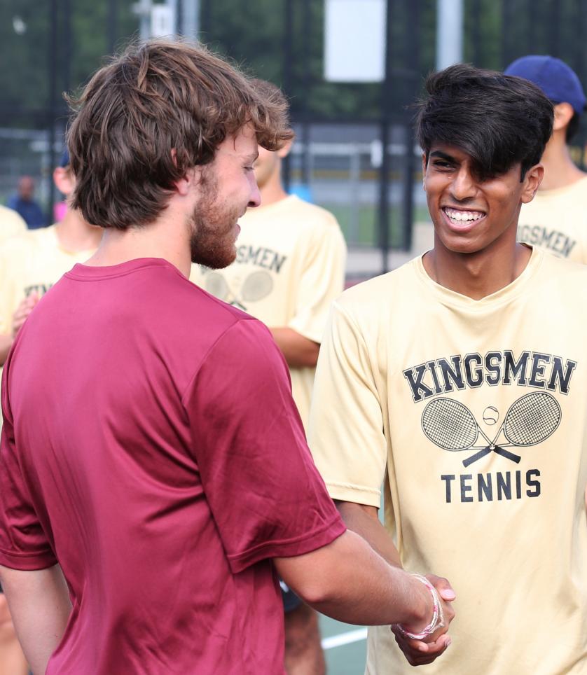 Sid Das shakes hands with his opponent from Mishawaka before a Penn Boys Tennis match.