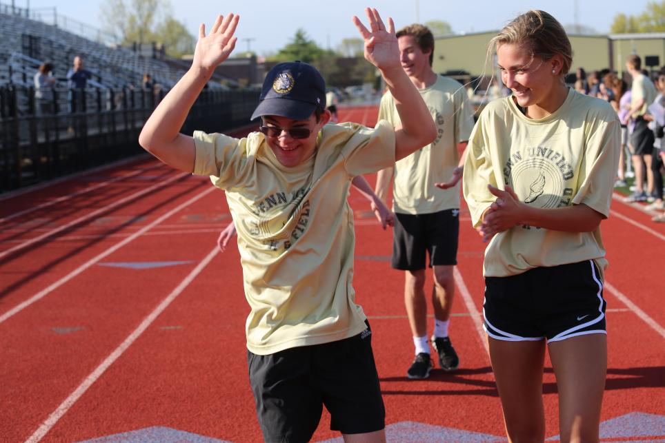 students rejoice after finishing a race