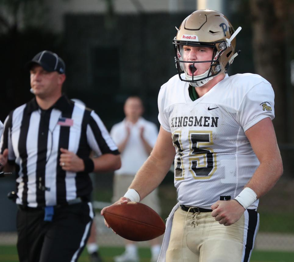 Penn quarterback Ron Powlus celebrates scoring a touchdown.
