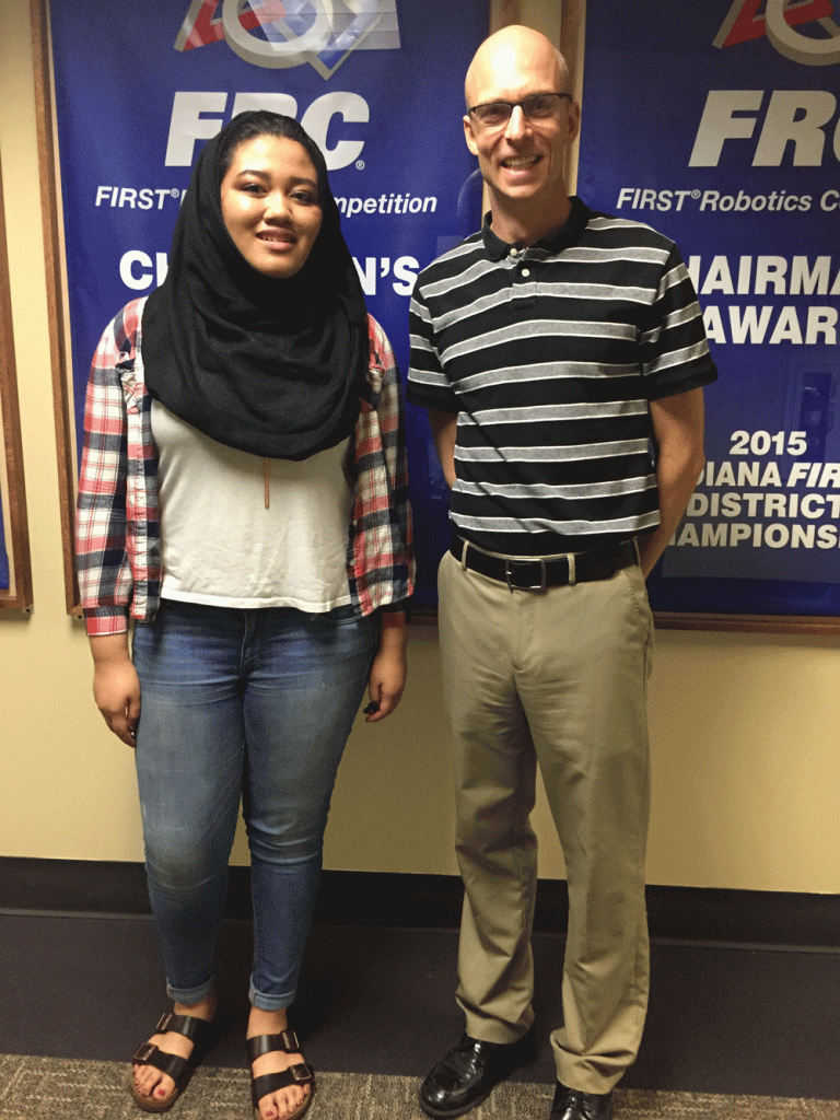 Taqia Heryadi, a sophomore at Penn, pictured with Penn Robotics instructor Jim Langfeldt, is one of three students to represent Indiana at the Robotics World Championships in St. Louis on April 26-30.