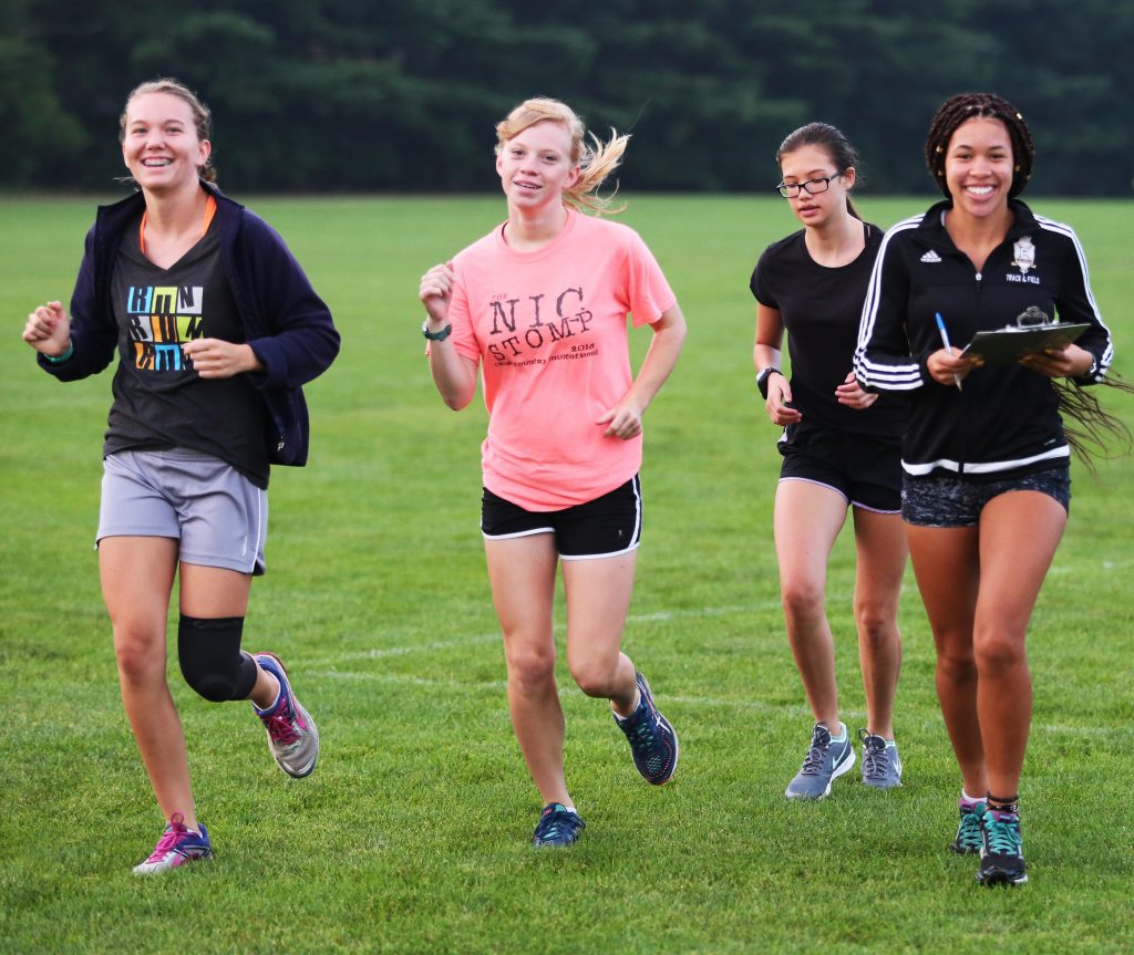 Penn Girls Cross Country runners logging some miles.