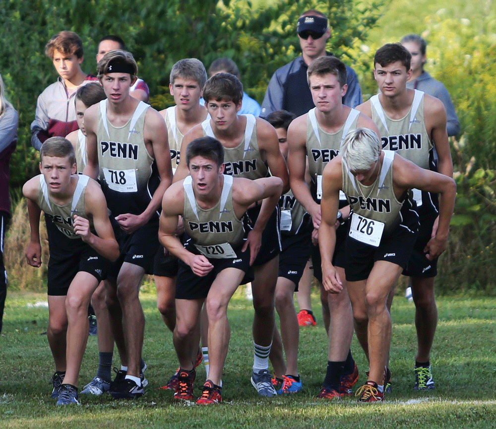 The Penn Boys Cross Country Team lines up to start the race.