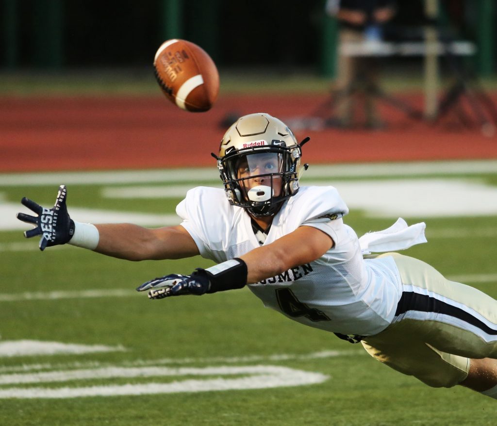 Zach Usenick stretches out for a catch.