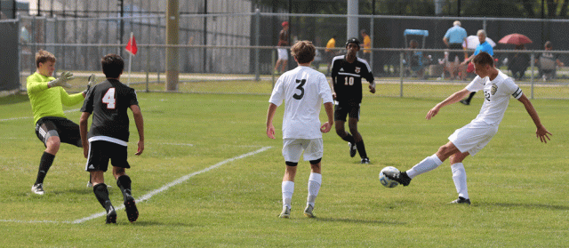 Micah Craig kicks in a goal.