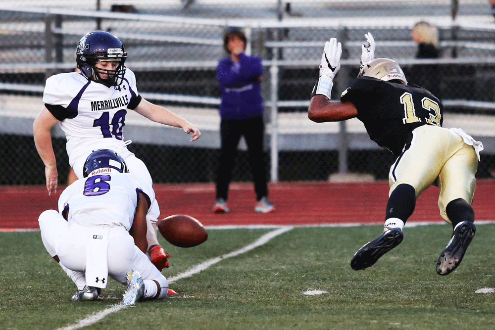 Paul Moala blocks a field-goal attempt.