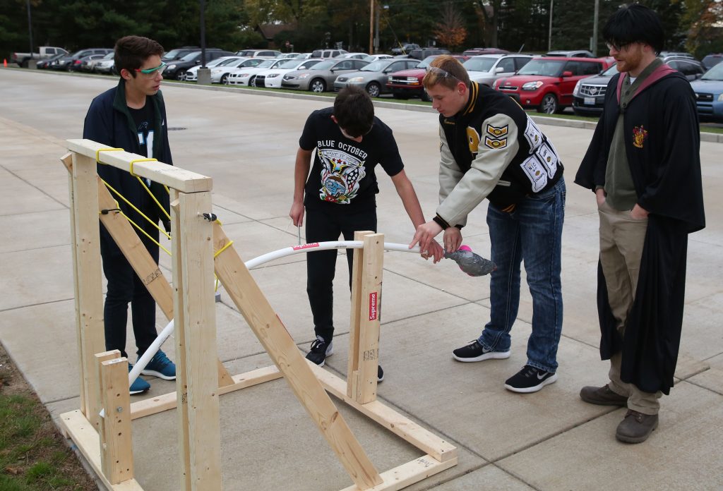 Penn students get ready to launch pumpkin
