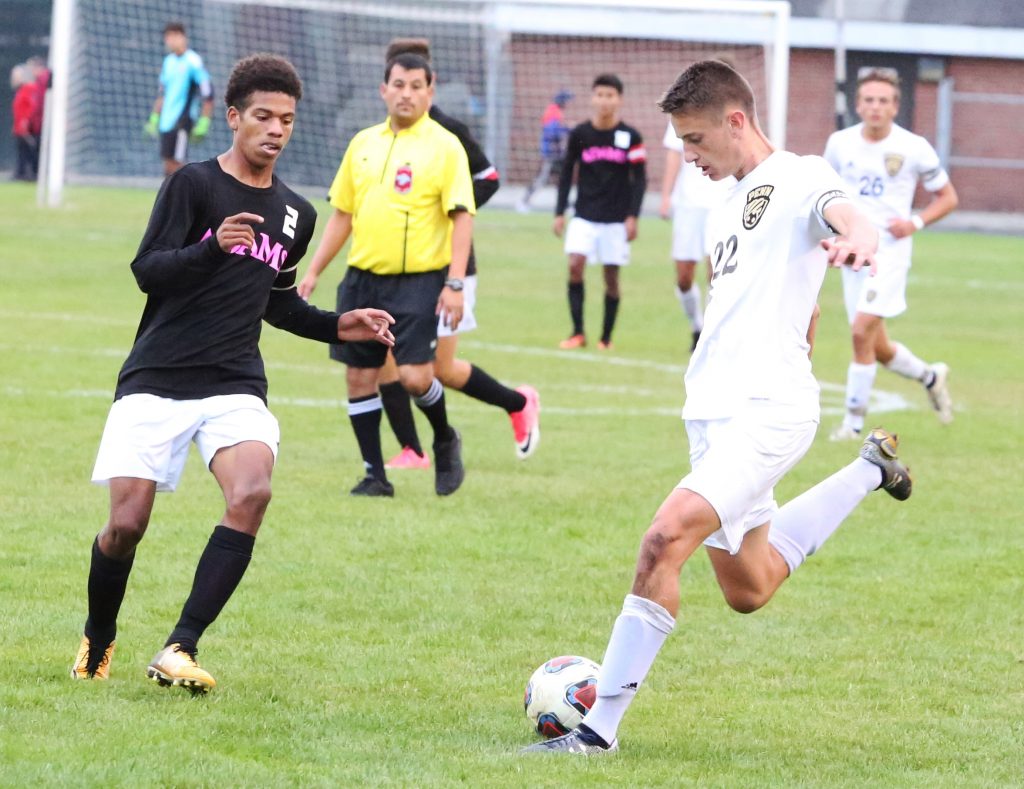 Micah Craig of Penn takes a shot on goal.