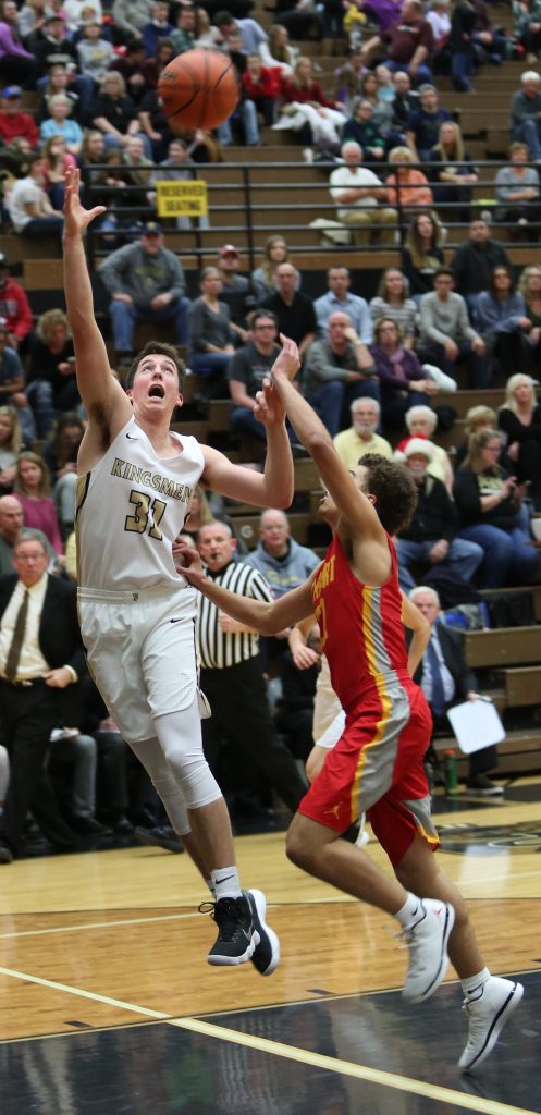 Noah Krathwohl leaps to catch the ball on a fastbreak.