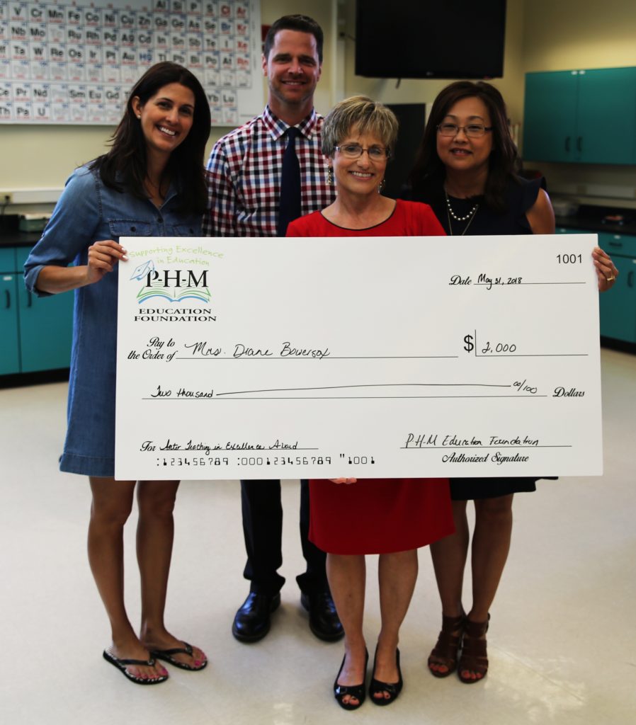 From left, Darla Lippert, Sean Galiher, Diane Bowersox and Mari Linn Wise  at the presentation of the P-H-M Education Foundation Jeneane Arter Teaching in Excellence Award.