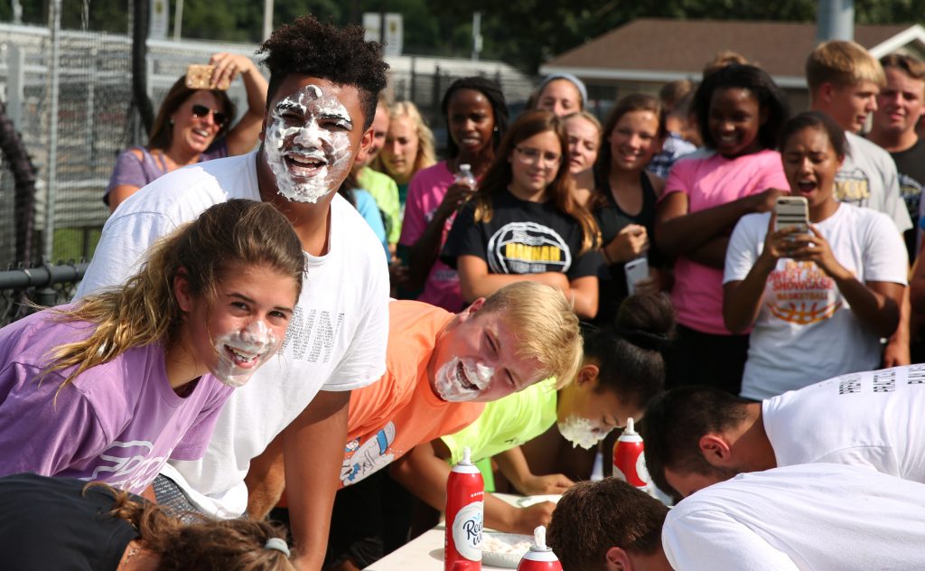 A pie-eating contest was part of the festivities at the Kingsmen Luau.