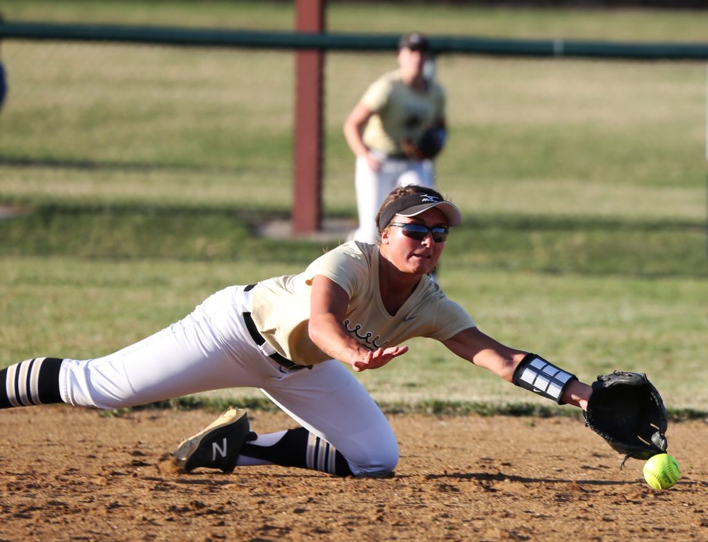 Brenna Brown dives for the stop.