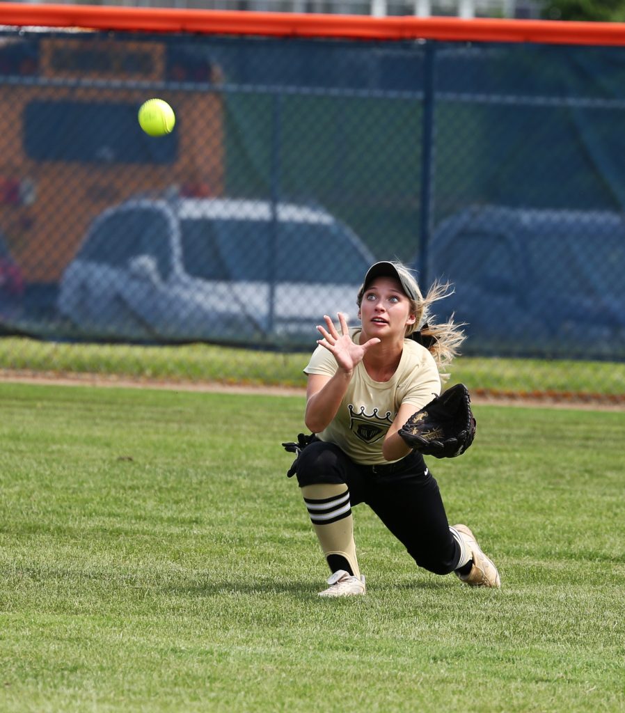Ryleigh Langwell drives to make a catch in centerfield.