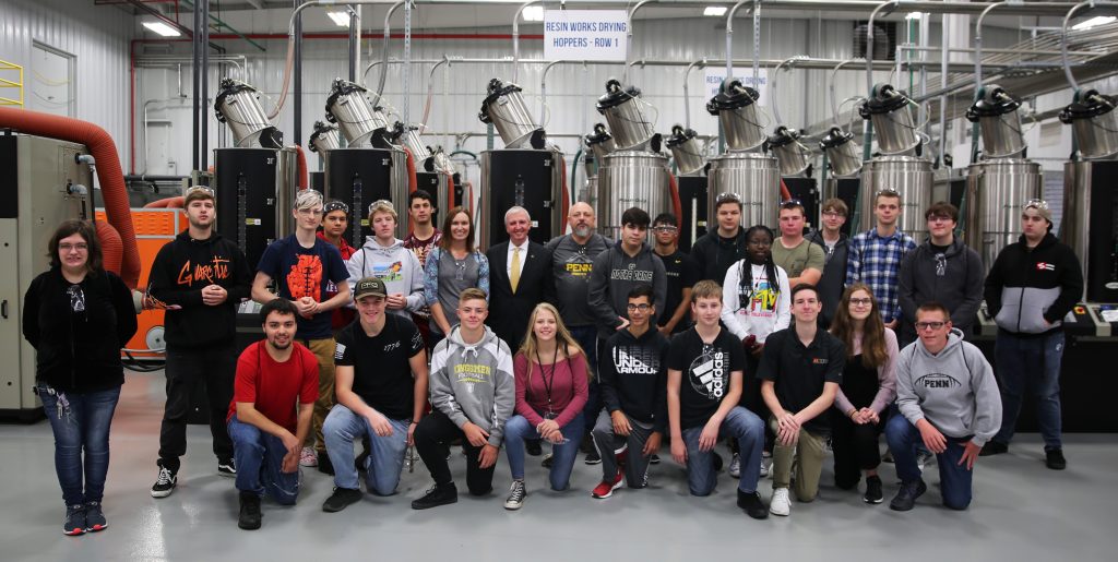 P-H-M Supt. Dr. Jerry Thacker, Penn Instructors Tara Pieters & Scott Shelhart, and Penn students at the Manufacturing Day Kickoff.