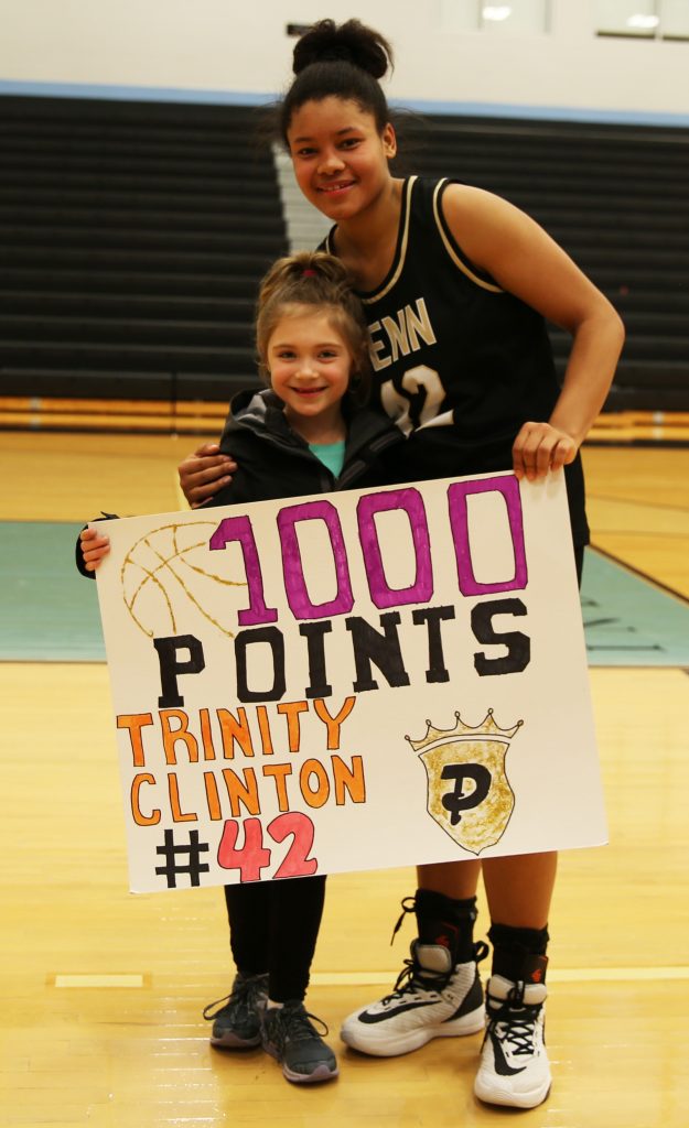 Penn's Trinity Clinton, with the daughter of Penn Girls Basketball Coach Kristi Ulrich.