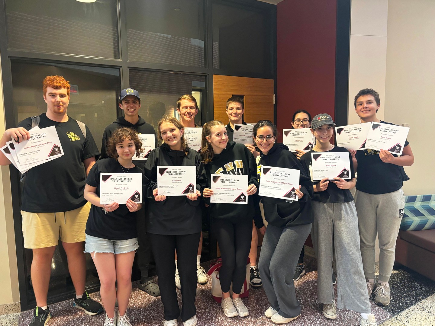 Penn High School's Penn News Network (PNN) won 20 awards at the Ball State University Annual JDay+/CCIM+ Program. Those awards include two team awards, Honorable Mention for "PNN Morning Announcements" and Excellent Award for "PNN Show", and 18 individual awards won by 14 students.
The Ball State event is a media and communications conference for middle and high school students. The conference, in its 70th year, provides learning and professional development opportunities across all journalism, media, technology and communications areas.
Junior C.J. Vantine was honored three awards: Superior Awards in Creative Writing and News Package, and an Excellent Award in News Package.
Sophomore James Mason was also honored three awards for his work: Superior in Sports Play-by-Play, Excellent in Sports Play-by-Play and Honorable Mention in Sports Story Package.
Visit the URL for a full list of PNN's awards: https://penn.phmschools.org/2025/04/29/pnn-students-earn-top-honors-at-ball-state-jday-program/