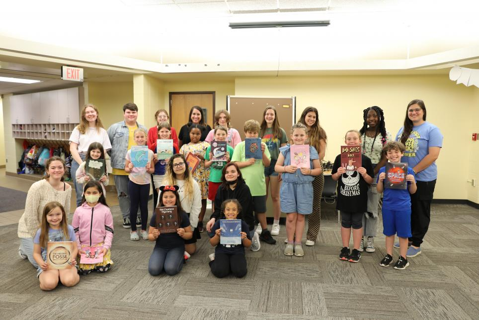 Ms. Helman & Miss Dunfee with their student authors & illustrators
