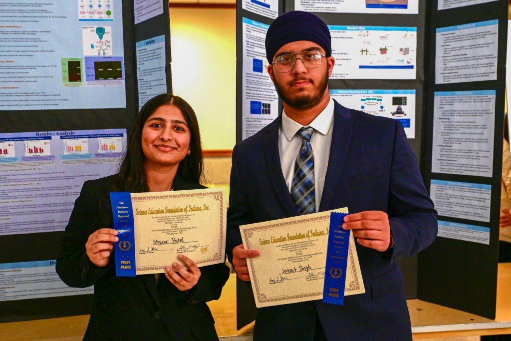 students pose with first place ribbons