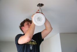 Penn Student installs light