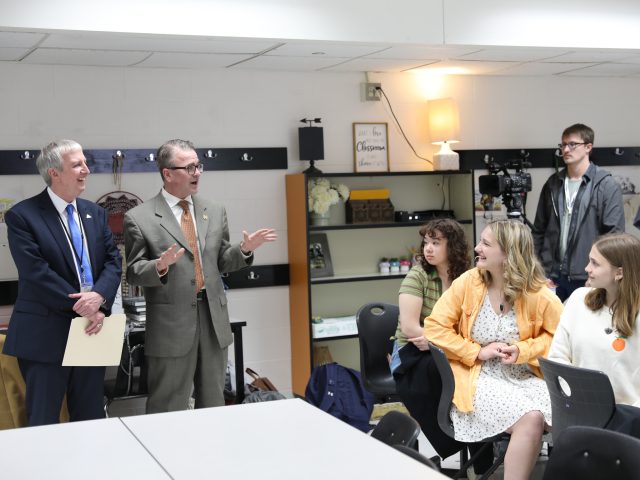 Dr. Thacker & Mr. Chris Riley talking to students