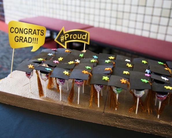 Congratulations graduates! A proud moment captured in a photo of a graduation cake decorated to look like a graduation cap