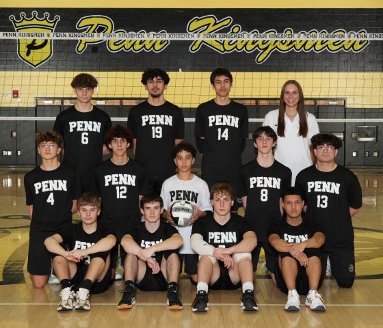 Penn Boys Volleyball JV team posing for a group photo.